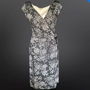 This wrap dress is just gorgeous! Beautiful floral black and tan!